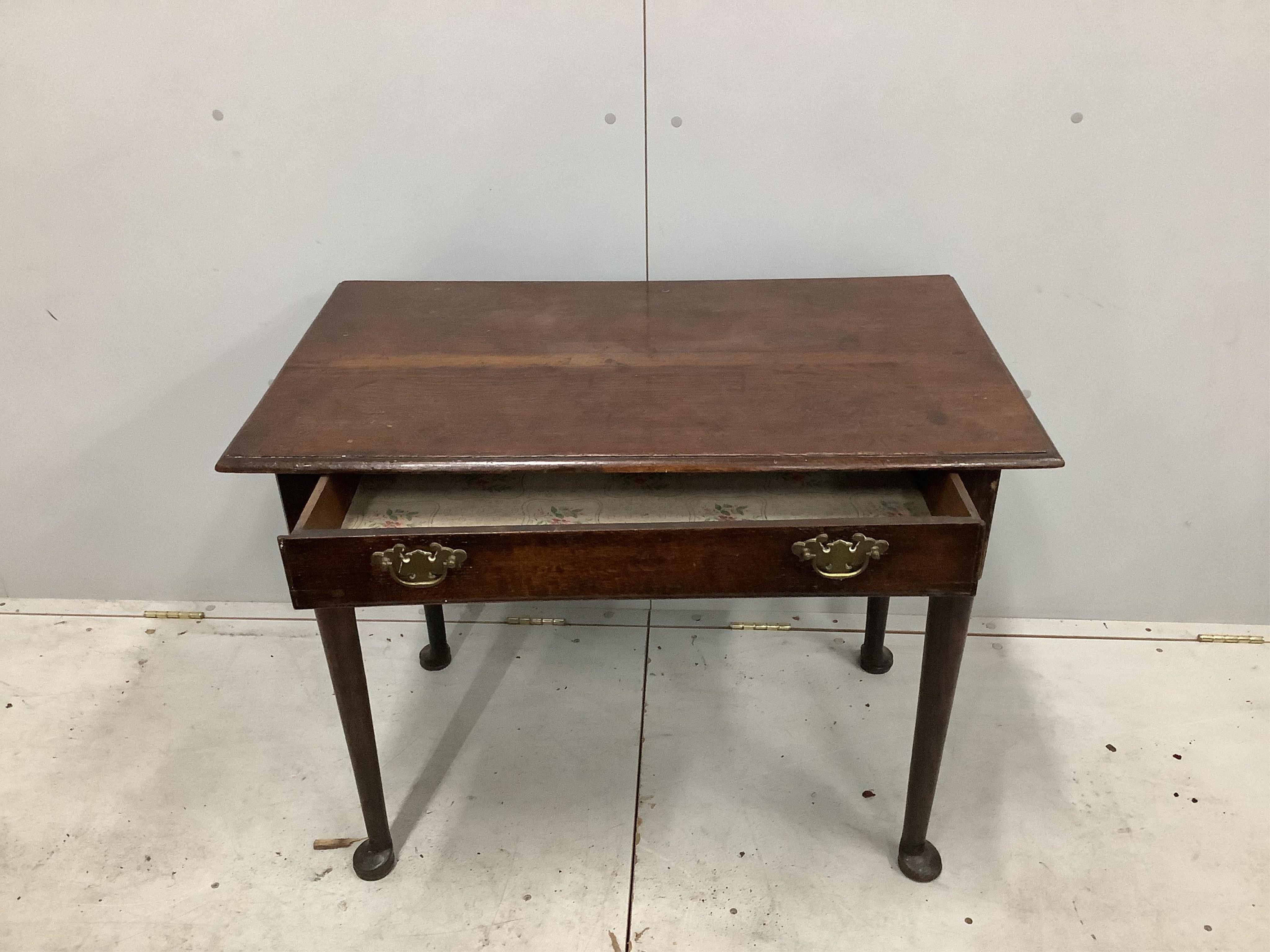 A George III oak side table fitted drawer on pole turned legs with pad feet, width 90cm, depth 54cm, height 69cm. Condition - fair